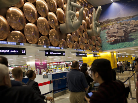 Passengers line up at New Delhi international airport. A growing number of countries are blocking flights from India as the country continues to report a record number of daily infections, hit hard by the second wave of the COVID-19 virus.