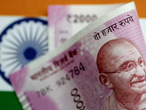File picture of the Indian rupee note. The IMF raises concerns that fiscal stimulus could further imperil India's economy.