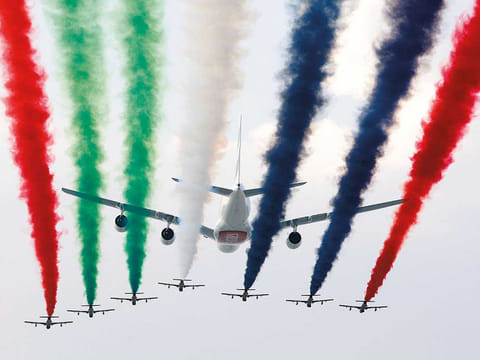 An Emirates A380 aircraft and the UAE's Al Forsan aerobatic team at an earlier edition of Dubai Air Show.