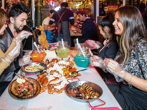 Communal dining is best done at a Filipino 'boodle fight' such as that at Dampa restaurant in Deira. Grilled or steamed seafood is dumped on a shared table with piles of rice, corn and sauce for group diners to dig into.