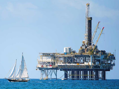 An offshore oil platform. Oil rose toward $46 a barrel as vaccine breakthroughs and expectations OPEC+ will delay ramping up production spurred demand optimism.