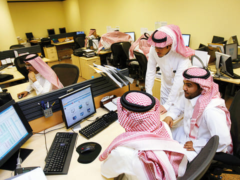 Traders at the Tadawul All Share Index in Riyadh.