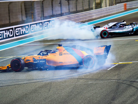 Lewis Hamilton and Fernando Alonso making Doughnuts after the Abu Dhabi Grand Prix.
