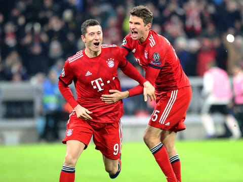 Bayern forward Robert Lewandowski, left, with Thomas Mueller.
