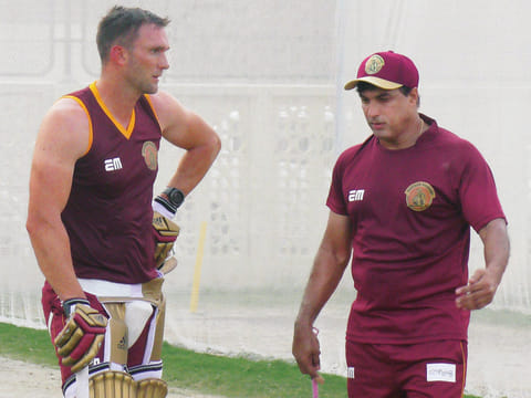 Robin Singh giving a few tips to Northern Warriors’ Hardus Viljoen during a training session ahead of the T10 League in November last year. The former Indian all-rounder has been a coach since he retired in 2004 and has helped many stars early in their careers.