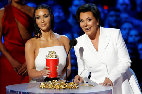 Reality stars Kim Kardashian and Kris Jenner accept the award for Best Reality Series or Franchise at the 2018 MTV Movie & TV Awards at Barker Hangar in Santa Monica, California, U.S., June 16, 2018.