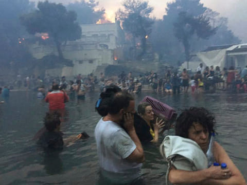 Greece grants 3 migrants citizenship after they saved lives in wildfire