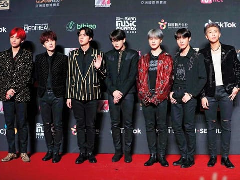 BTS members V, Suga, Jin, Jungkook, Jimin, J-Hope and RM.