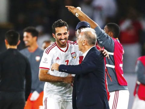 UAE’s Ali Mabkhout celebrates scoring their second goal with coach Alberto Zaccheroni during their Group A match against India at the Zayed Sports City Stadium on Thursday.