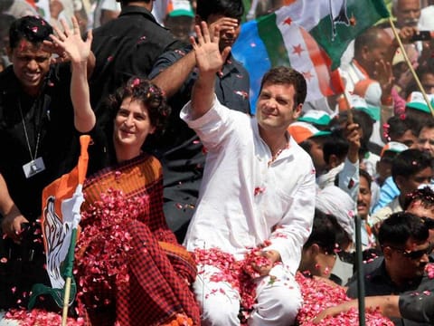 File photo: Rahul Gandhi with his sister Priyanka Vadra waves to supporters on the way to file his nomination papers for Amethi parliamentary seat, in Amethi.