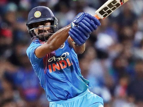 Vijay Shankar (R) plays a shot during the third Twenty20 international cricket against New Zealand in Hamilton on February 10, 2019.