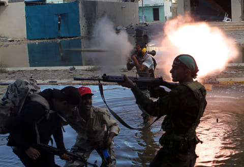 File picture shows fighting near Sirte. The GNA forces have been gathering personnel for weeks near the city.