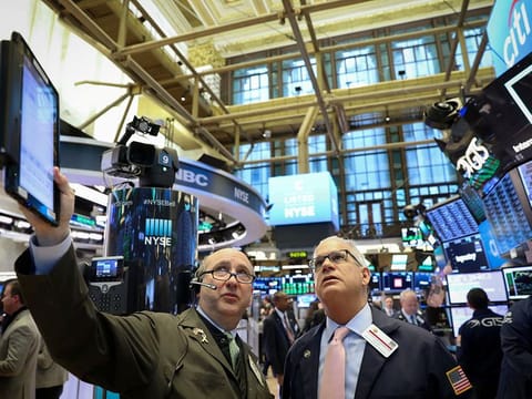 Traders work on the floor of the New York Stock Exchange (NYSE). Investors have come to terms with the US presidential election outcome and the focus is now shifting towards how soon the world’s largest economy can regain its footing amid a raging pandemic.