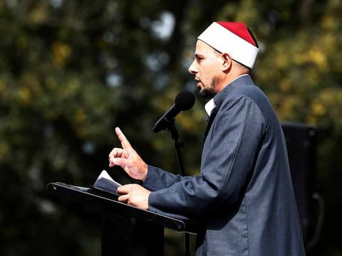 Imam Gamal Fouda leads a Friday prayer at Hagley Park outside Al-Noor mosque in Christchurch, New Zealand March 22, 2019.