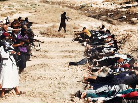 This June 2014 image shows Daesh militants executing captured Iraqi security forces members.