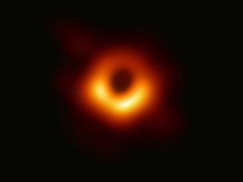 Revealed: First photograph of black hole and its fiery halo