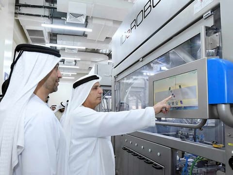 Al Tayer inspecting the number plates factory