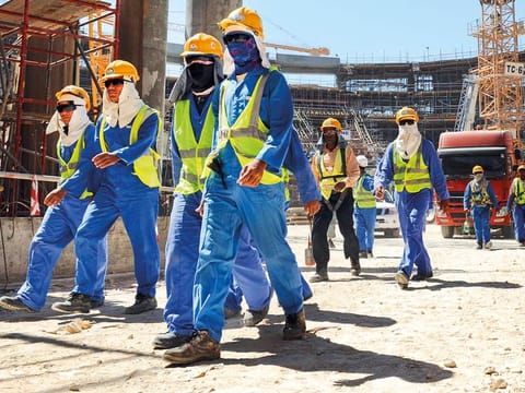 A construction site in Doha. Rights groups say more than 1,200 migrant workers have died building World Cup facilities.