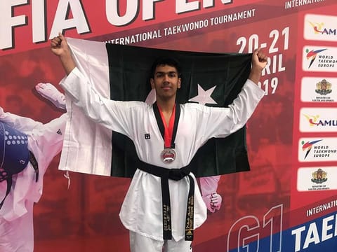 Sinan after winning the Silver Medal at Sofia Open Taekwondo Championship in Bulgaria