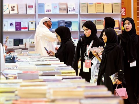 Visitors peruse the shelves at Abu Dhabi International Book Fair at Adnec, during the previous edition of the event in 2021. Picture for illustrative purposes only.