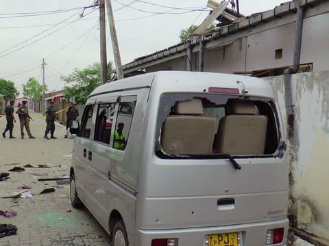 Sri Lankan police and army soldiers secure the site after an explosion and a gunbattle in Kalmunai, eastern Sri Lanka Saturday, April 27, 2019.