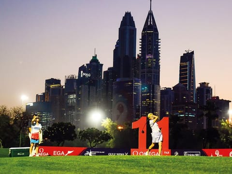 Trish Johnson tees off on hole 11 during the Omega Dubai Moonlight Classic.