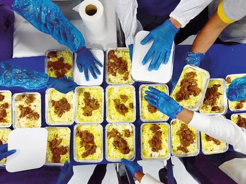 Iftar meals being packed for distribution. For illustrative purposes only.