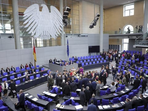 Lawmakers attend a polling at the German federal parliament, Bundestag, at the Reichstag building in Berlin, Germany, Friday, May 17, 2019.