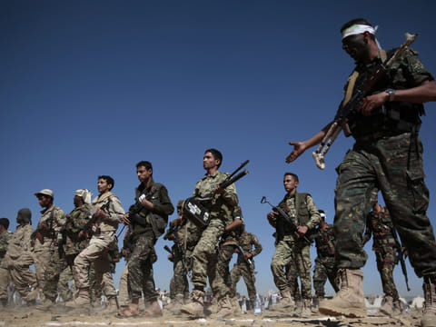 File photo: Al Houthis march during a gathering in Sanaa, Yemen.
