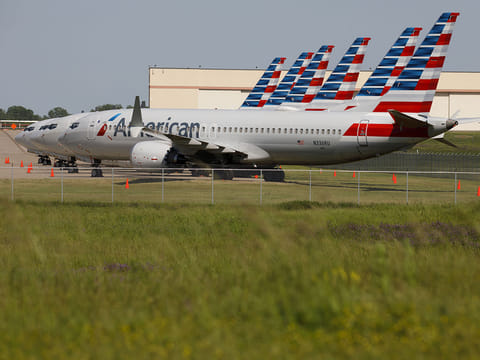 American Airlines Group Inc. Boeing Co. 737 Max planes sit parked at Tulsa International Airport (TUL) in Tulsa, Oklahoma. Boeing's best-selling jet was grounded worldwide in March 2019 after two crashes five months apart killed a combined 346 people.