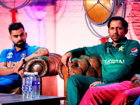 India's Virat Kohli (left) and Pakistan's Sarfraz Ahmad take part in a captains press conference ahead of the 2019 ICC Cricket World Cup in London on May 23, 2019.