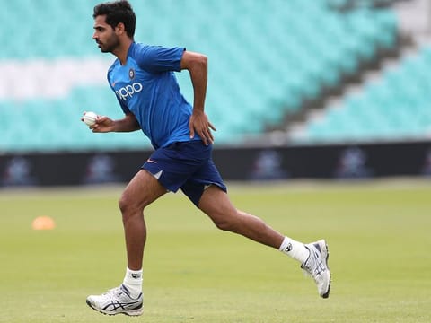 India's Bhuvneshwar Kumar runs to bowl in the nets during a training session at The Oval in London, Friday, May 24, 2019.