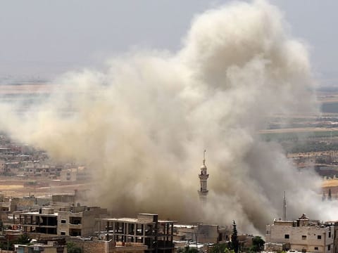 Smoke plumes following reported airstrikes on the town of Khan Sheikhun in the southern countryside of the rebel-held Idlib province on June 3, 2019.