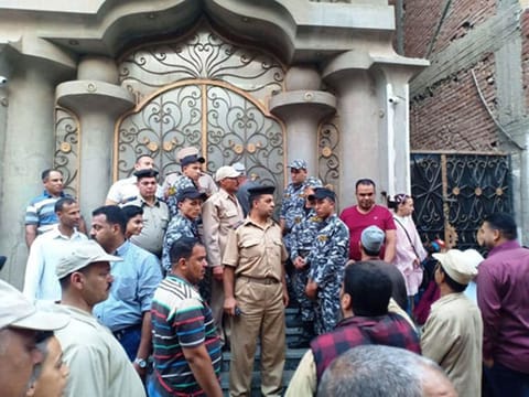 Security forces fend off enthused fans in Mohammad Salah's hometwon.