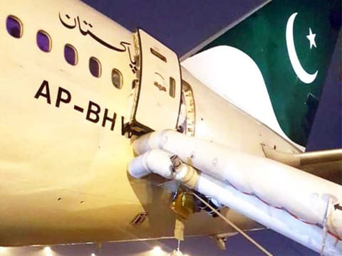 Emergency chute was deployed when a passenger mistakenly opens an emergency exit door thinking it's was toilet door at Manchester Airport on Friday.