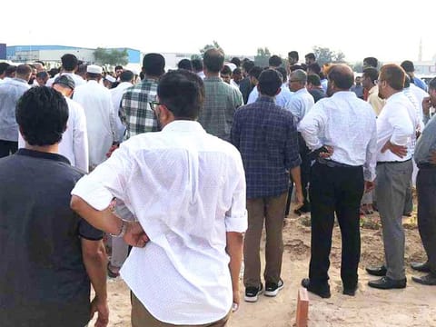 Relatives and friends attend the funeral for Mohammad Farhan. The Indian family were scheduled to fly home later this month for the wedding of their eldest daughter.