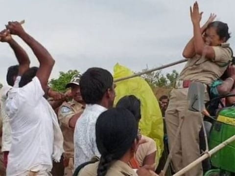 16 arrested for attacking female officer in India after viral video