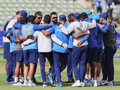 Indian players huddle together ahead of the World Cup match against Bangladesh in Birmingham, on Tuesday.