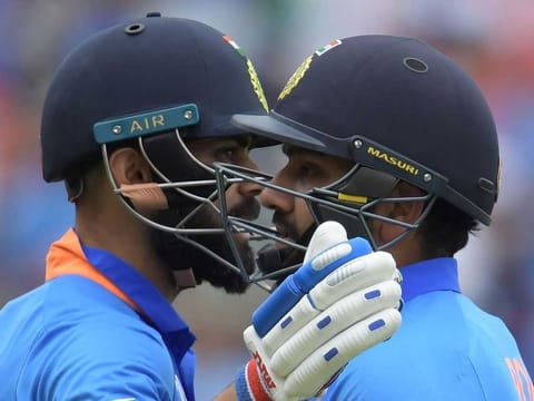 India's captain Virat Kohli (L) and Rohit Sharma