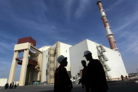 Iranian workers stand in front of the Bushehr nuclear power plant, about 1,200km south of Tehran, Iran.