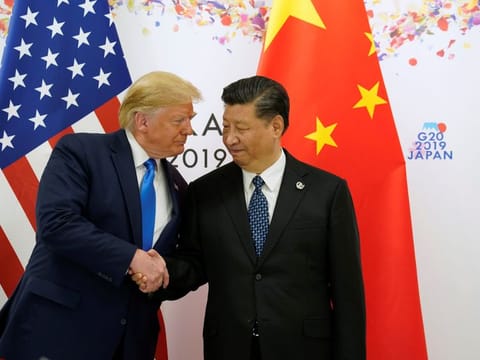 US President Donald Trump shakes hands with China's President Xi Jinping before starting their bilateral meeting during the G20 leaders summit in Osaka, Japan, on June 29, 2019.