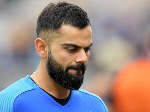 A disappointed India captain Virat Kohli after their defeat in World Cup semi-final.