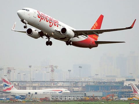 A SpiceJet aircraft takes off from the international airport in Mumbai.