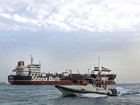 File picture: Iranian Revolutionary Guards patrolling around the British-flagged tanker Stena Impero as it's anchored off the Iranian port city of Bandar Abbas