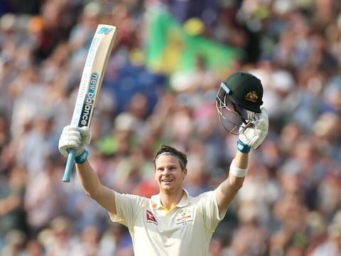 Australia's Steve Smith celebrates his century.