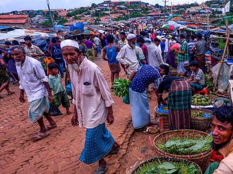 A Rohingya man sells betel leaves at a market at Kutupalong refugee camp in Ukhia.