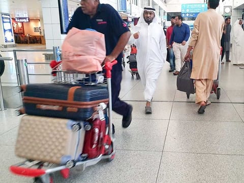 File picture of passengers at Dubai Airport. Public Prosecution will strictly apply the law to everyone who violates these instructions.