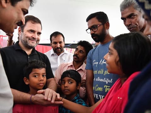 Congress leader Rahul Gandhi interacts with children