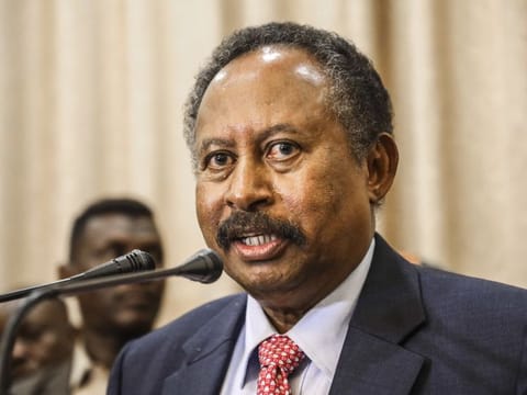 In this Wednesday, Aug. 21, 2019 file photo, Sudan's new Prime Minister Abdalla Hamdok speaks during a press conference in Khartoum, Sudan.