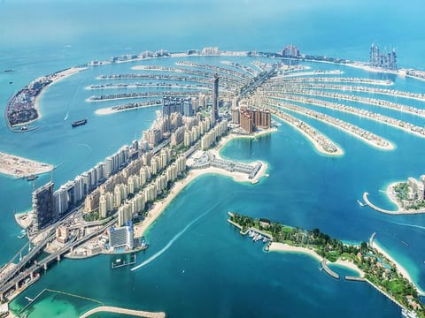 Aerial view of Dubai Palm Jumeirah island. Nakheel, the developer of Palm Island has slashed salaries by as much as 50 per cent as it tries to weather the coronavirus crisis.